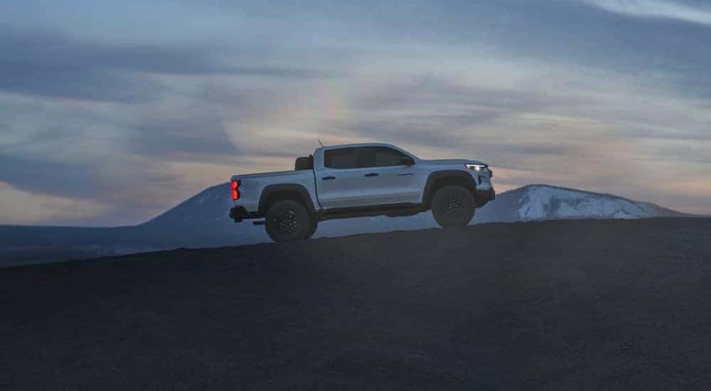 A white 2025 Chevy Colorado Bison parked off-road.