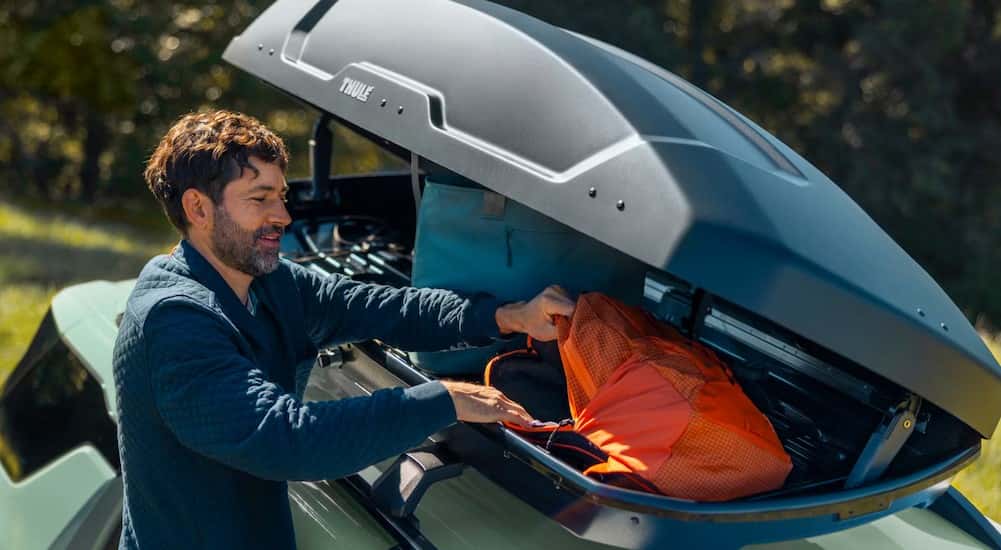 A Thule roof storage pod on a 2026 Chevy Equinox.
