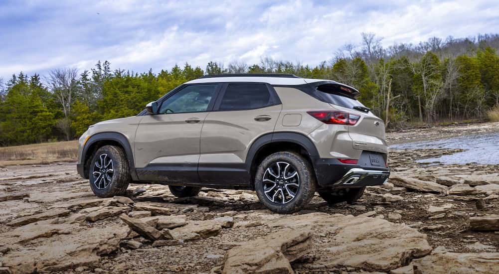 A tan 2026 Chevy Trailblazer parked off-road.