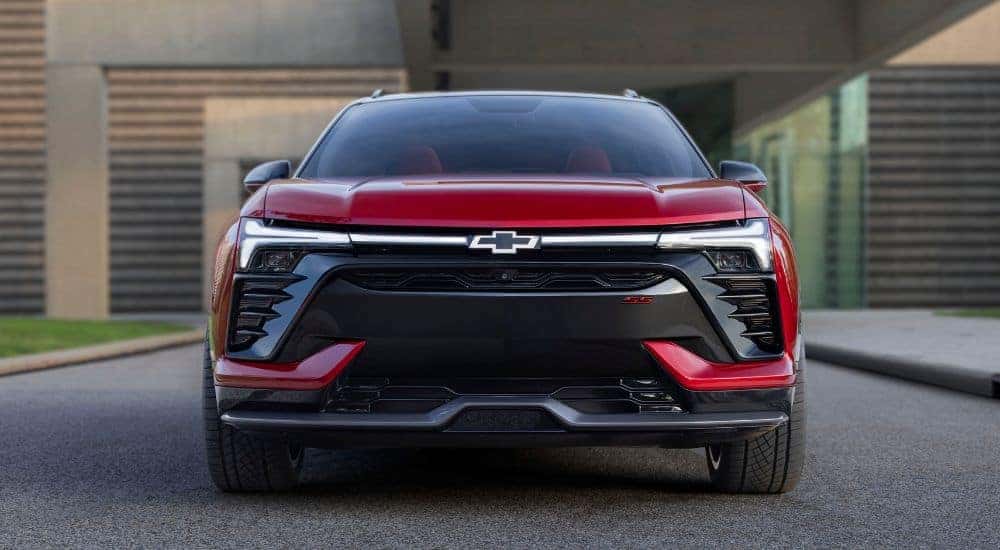 A red 2025 Chevy Blazer EV for sale in Cincinnati parked on pavement.