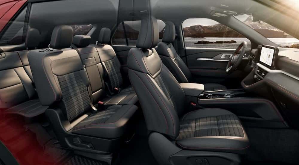 The gray interior in a red 2025 Ford Explorer.
