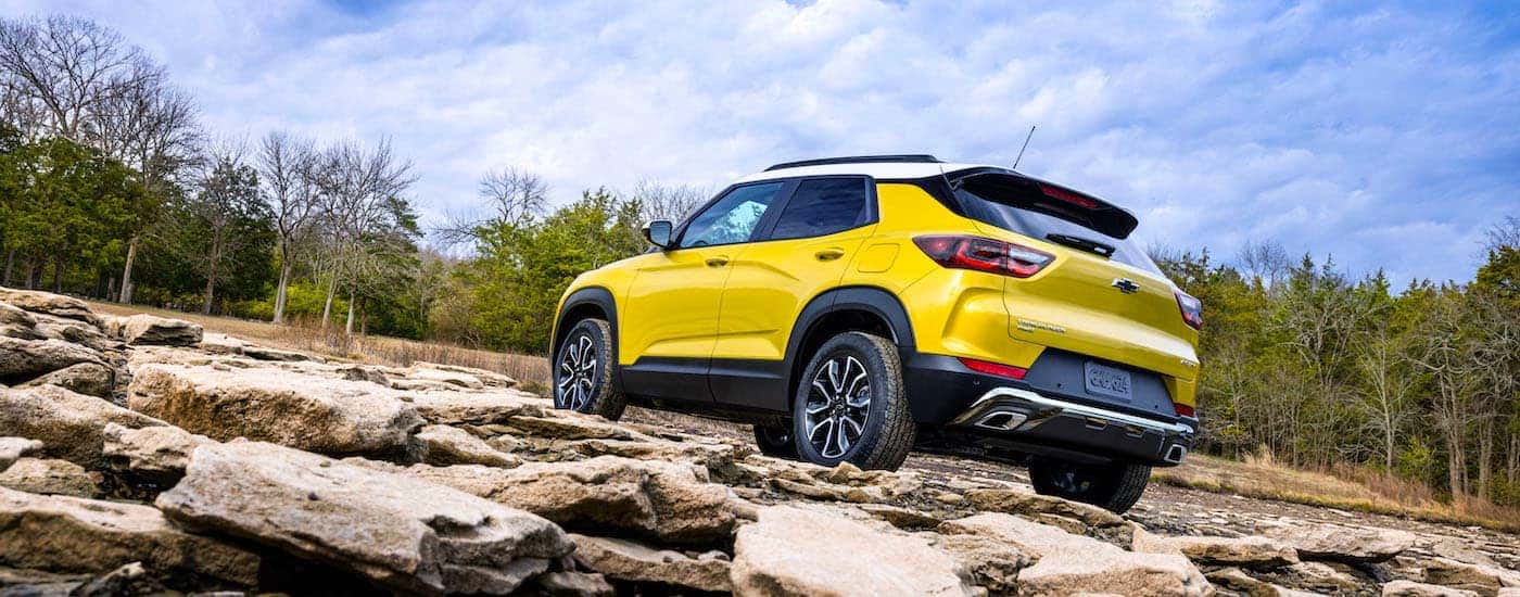 A yellow 2024 Chevy Trailblazer from the rear.