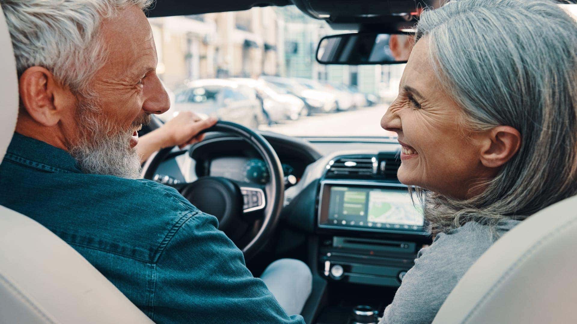 Couple driving in car
