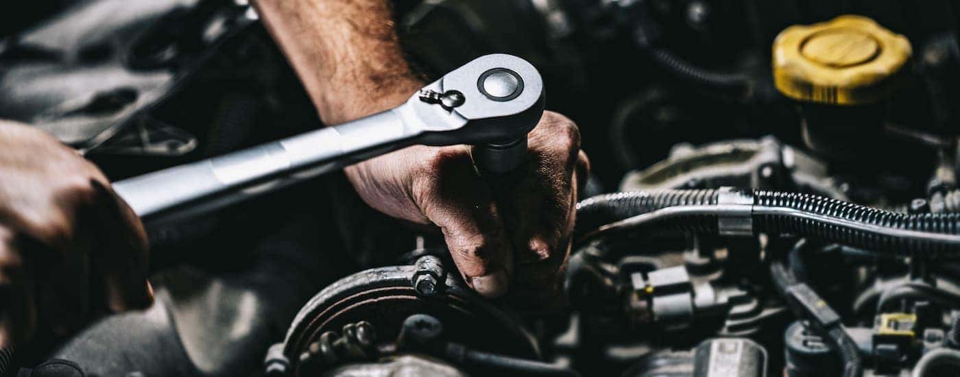 Mechanic working on an engine.