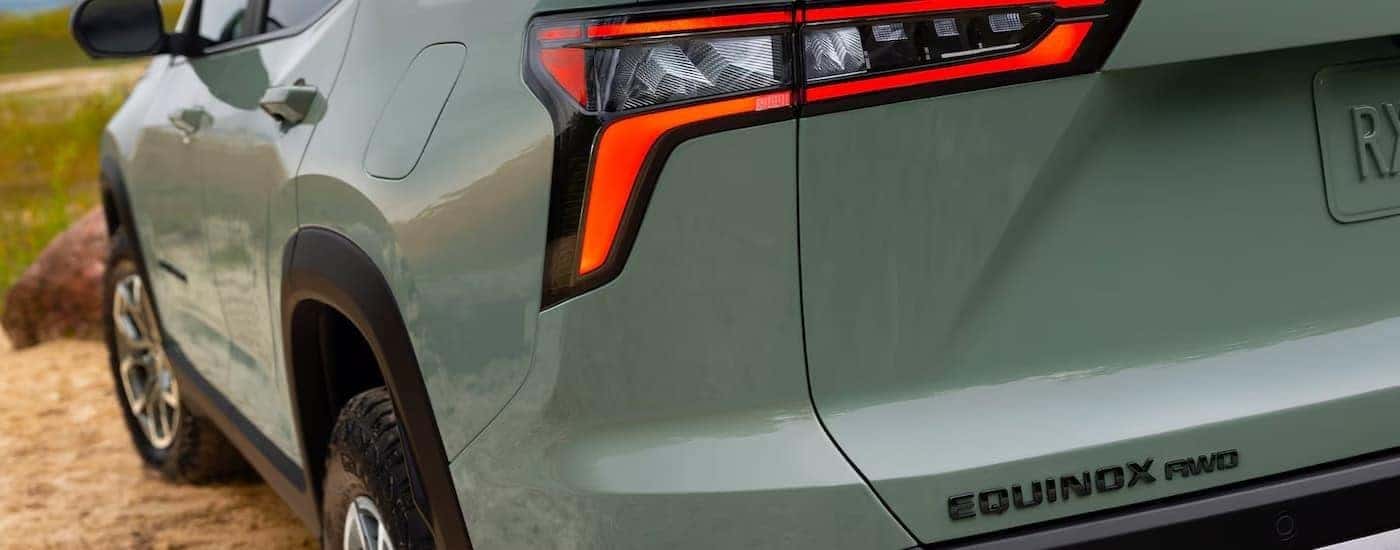 Rear of a green 2025 Chevy Equinox