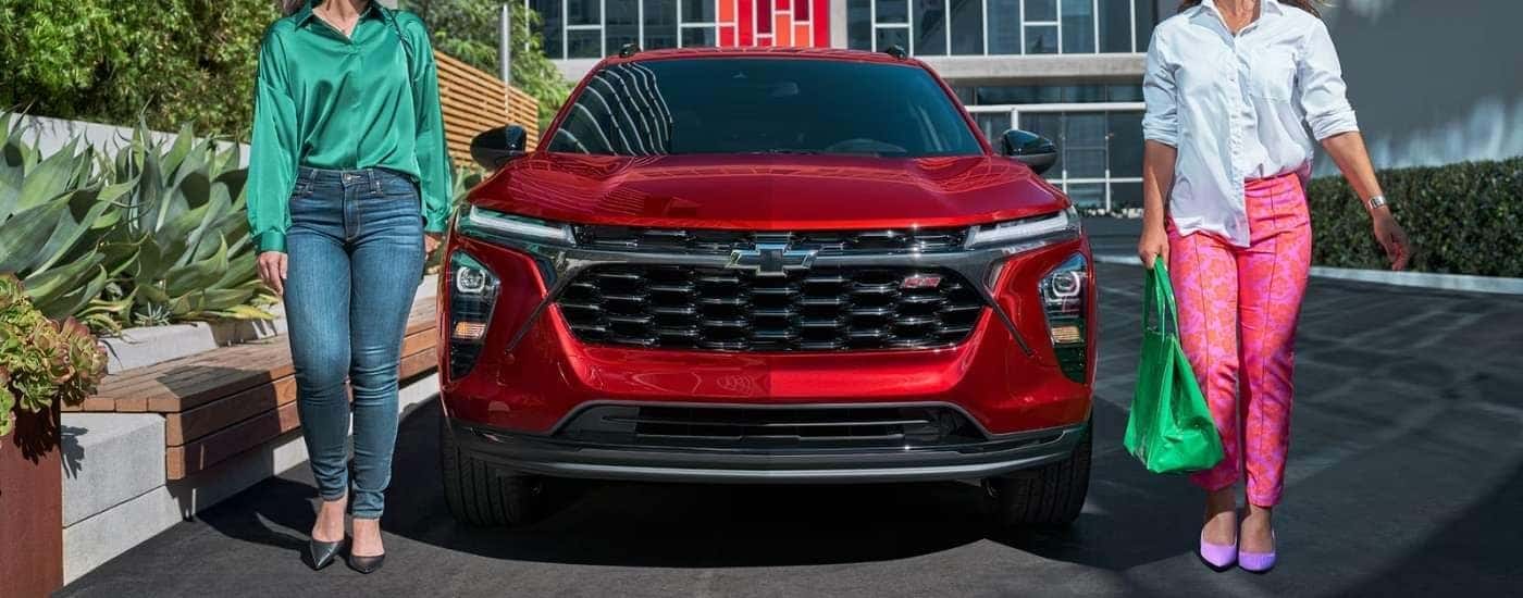 Front of a red 2025 Chevy Trax in a city