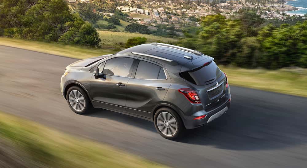 Grey 2017 Buick Encore driving on an open road