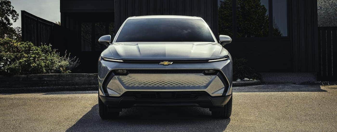 Front of a silver 2026 Chevy Equinox EV parked.