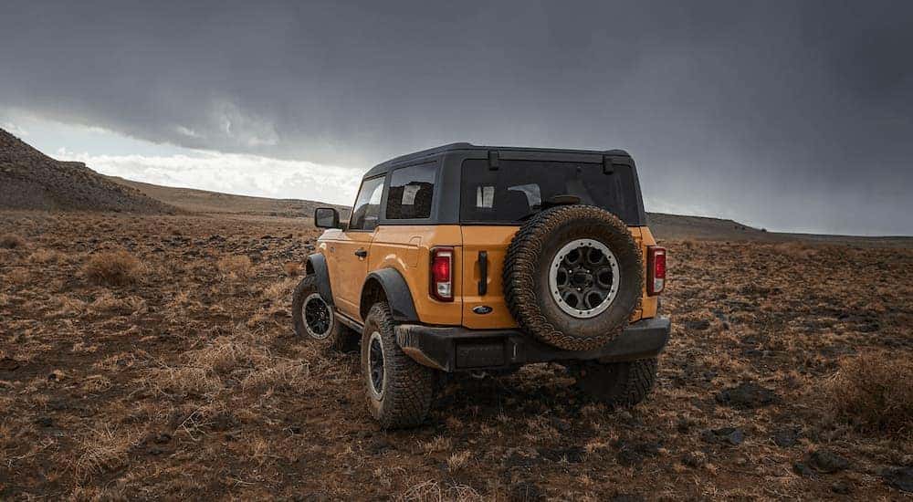 Yellow 2022 Ford Bronco Black Diamond parked off-road