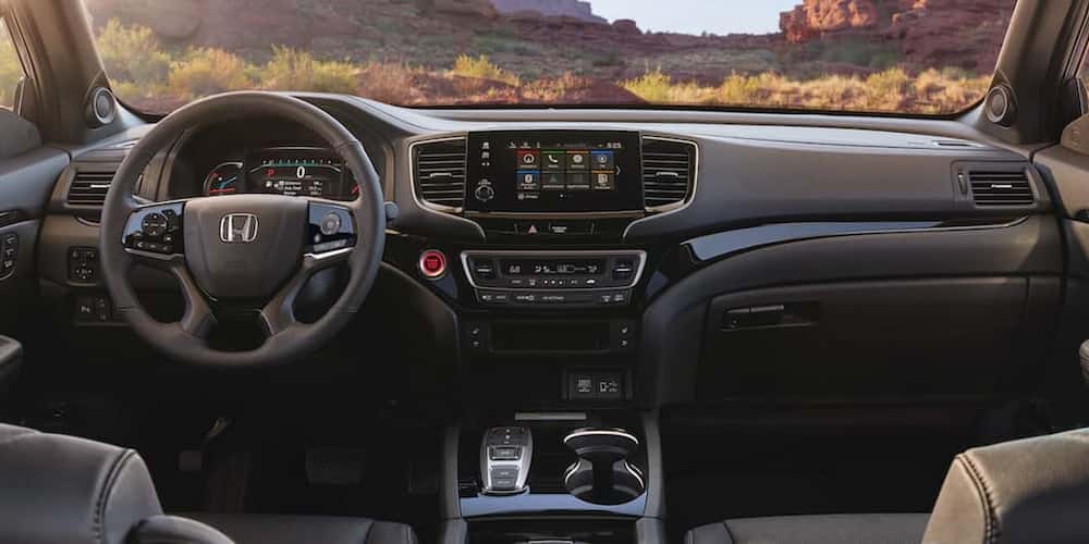 Black leather interior of a 2021 Honda Passport.