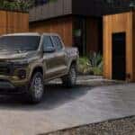 Green 2025 Chevy Colorado vs the 2025 Jeep Gladiator.