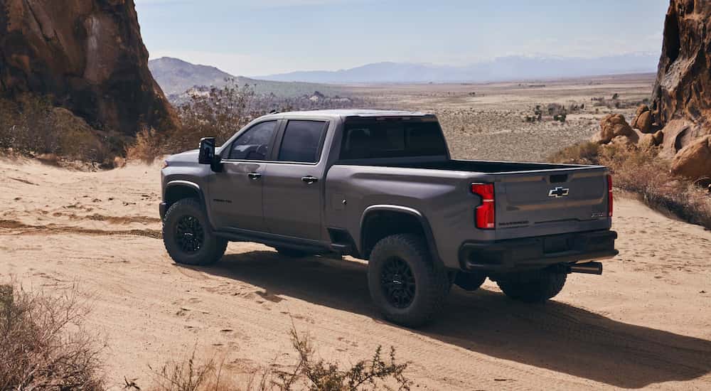 Grey 2025 Chevy Silverado 2500HD ZR2 for sale in Cincinnati parked off-road in the mountains.