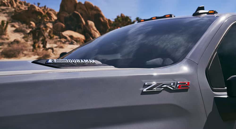 Hood badges of a 2025 Chevy Silverado 2500HD ZR2 Duramax.