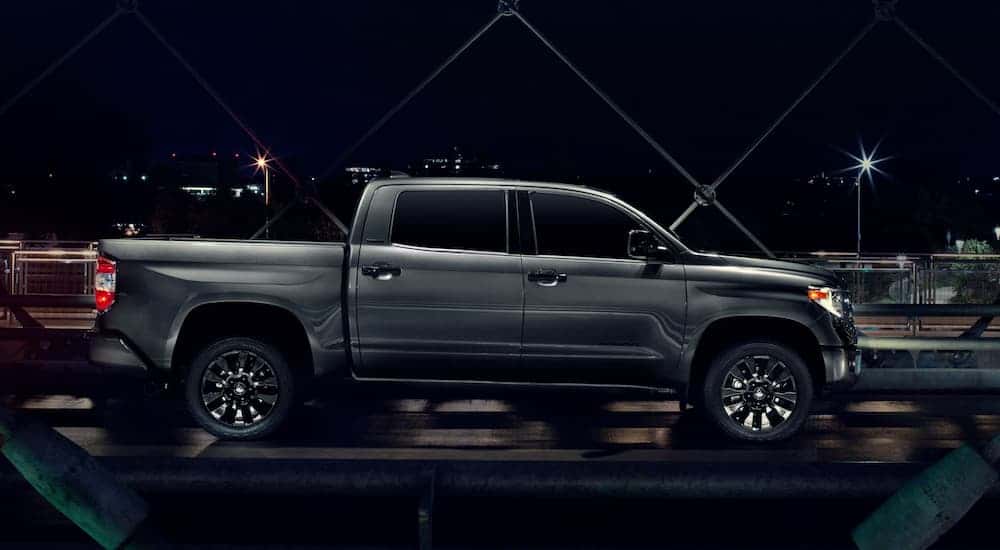 Black 2021 Toyota Tundra parked outside of a Toyota service center near Mason.