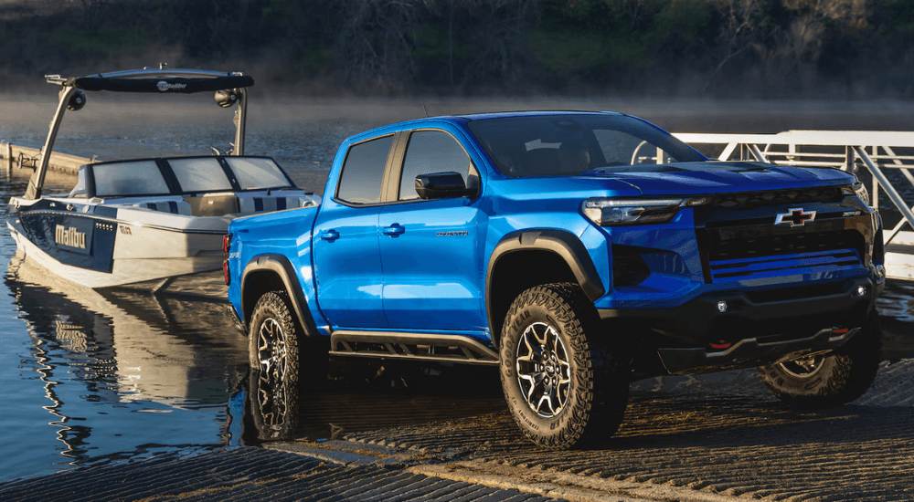 Blue 2026 Chevy Colorado ZR2 towing a boat