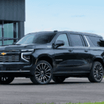 Black 2026 Chevy Suburban High Country for sale parked in front of a dealer