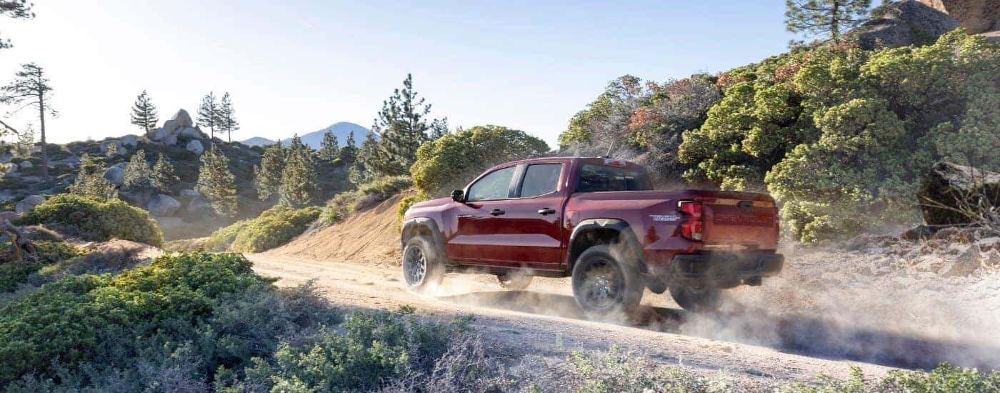 A red 2023 Chevy Colorado from the side.