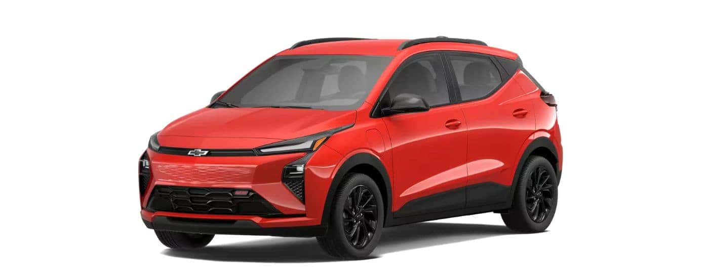 A red 2027 Chevy Bolt RS angled left.