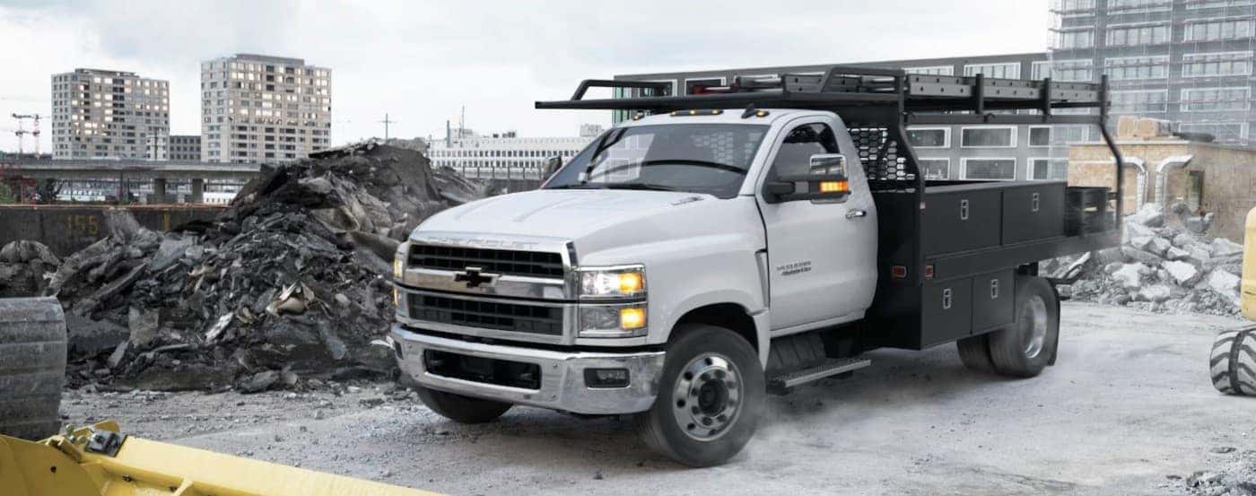 A white 2025 Chevy Silverado 4500 parked after viewing work trucks for sale near Middletown.