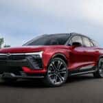 Red 2026 Chevy Blazer EV SS parked on a road.