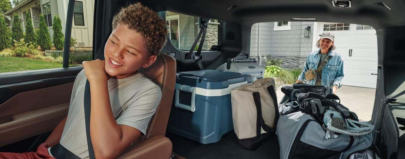 A child sitting in a 2026 Chevy Suburban.