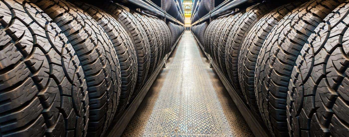 A store aisle filled with tires