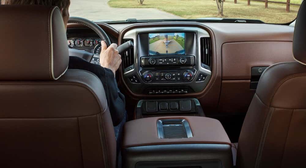 2018 Chevy Silverado brown leather interior showing a back up camera