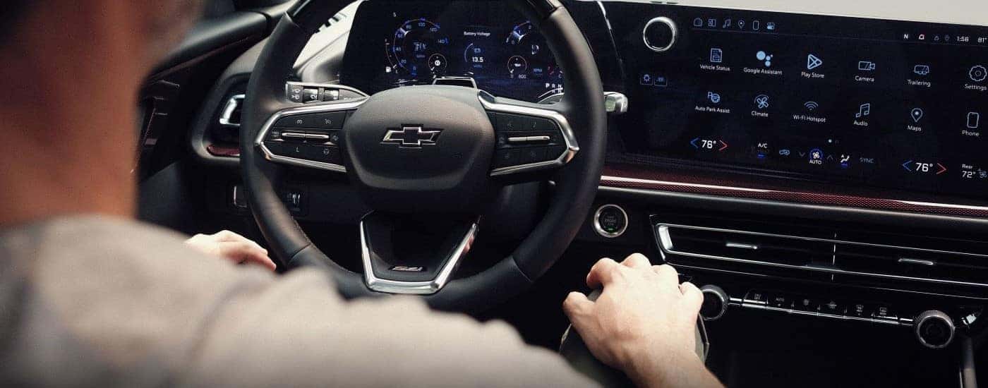 Steering wheel in the interior of a 2026 Chevy Traverse.