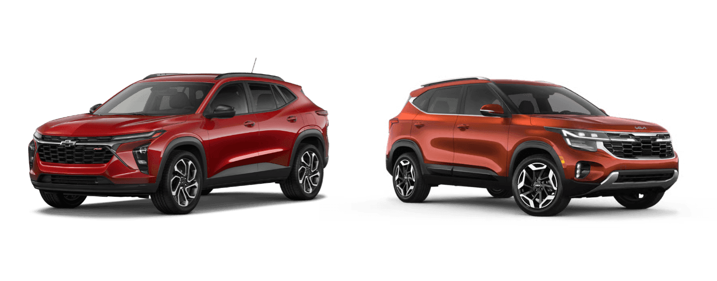 Red 2026 Chevy Trax and orange 2026 Kia Seltos