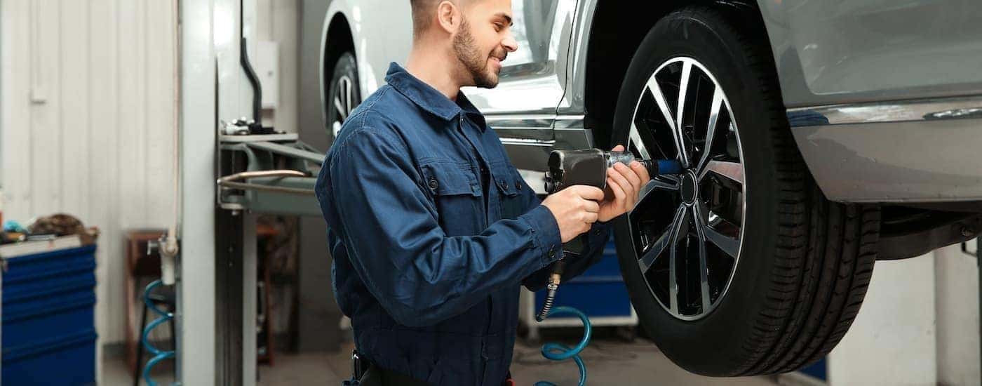 A mechanic changing a tire