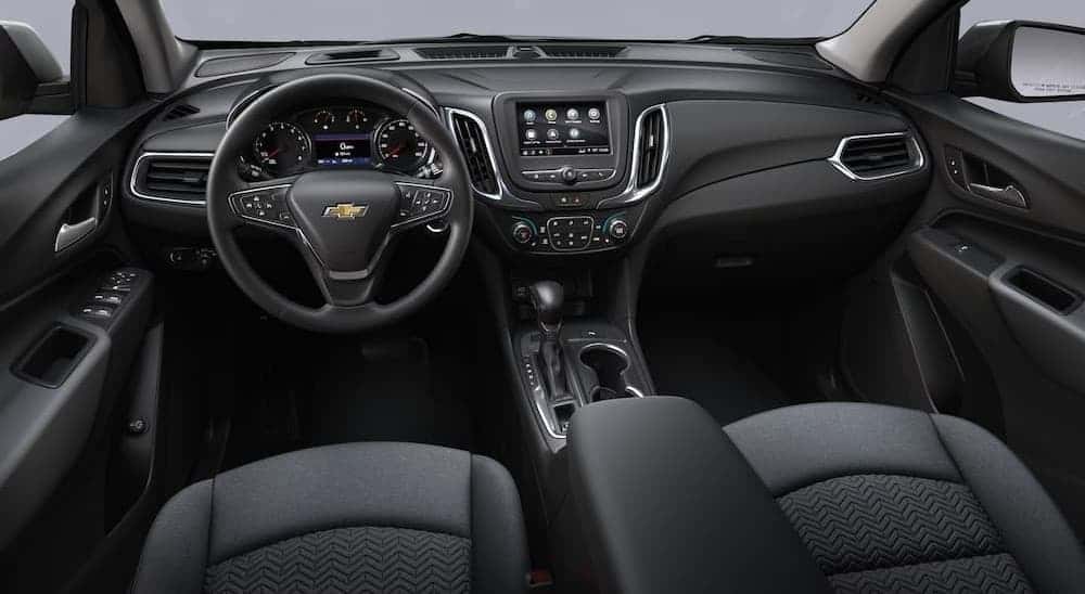 Black dash and interior in a 2023 Chevy Equinox.