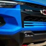 Close up of the grille on a blue 2026 Chevy Colorado.