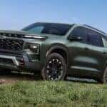 A green 2027 Chevy Traverse Z71 parked offroad.