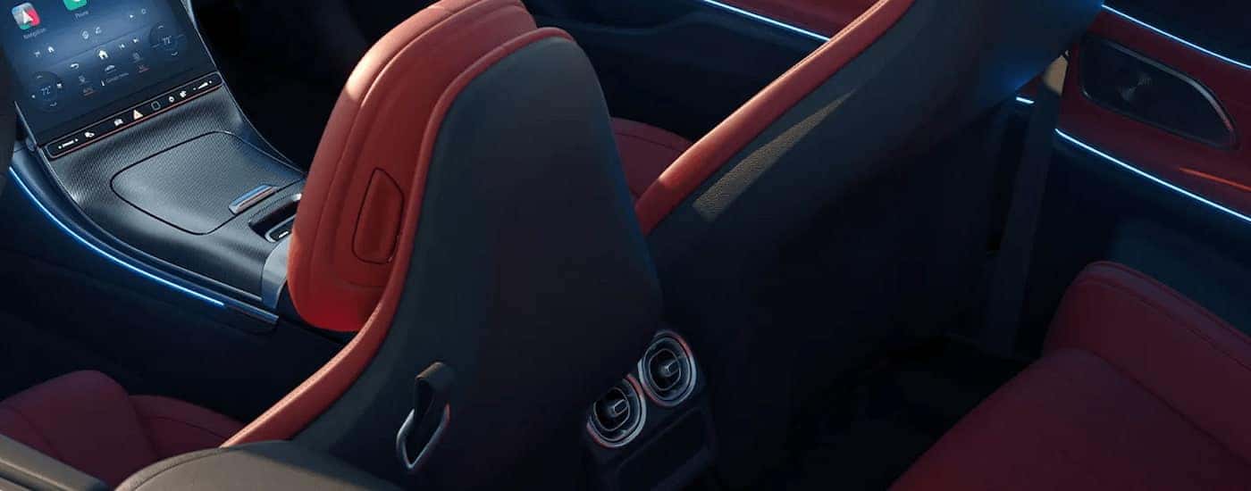 Red interior of a 2026 Mercedes-Benz CLE Cabriolet Coupe at a Mercedes-Benz dealer