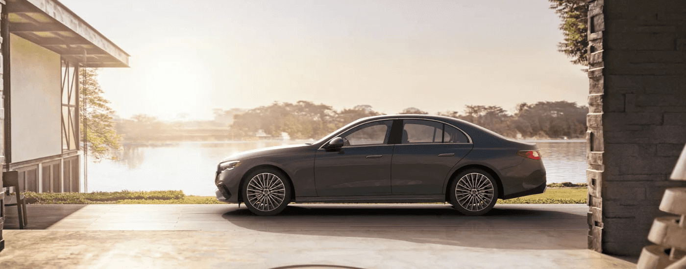 Grey 2026 2026 Mercedes-Benz E class parked in front of a house