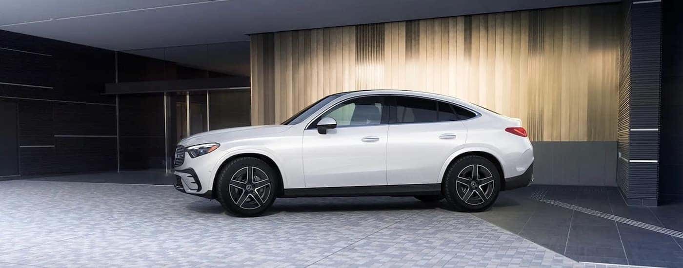 A white 2024 Mercedes-Benz GLC Coupe from the side.