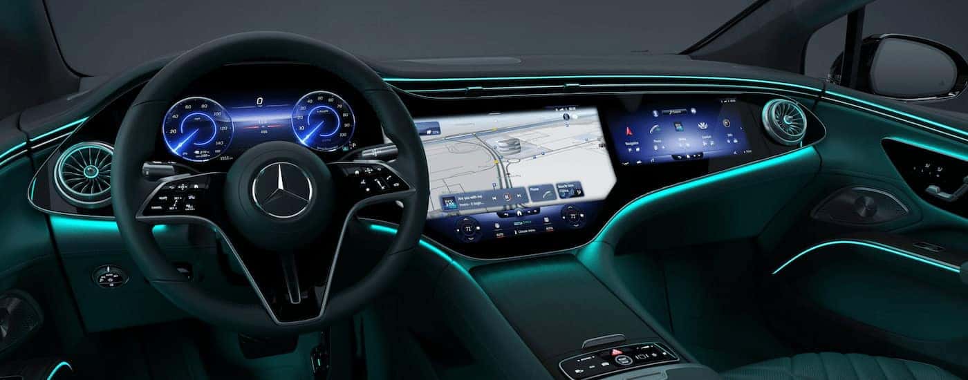 Illuminated interior and dashboard in a 2026 Mercedes-Benz EQS at a Mercedes-Benz dealer