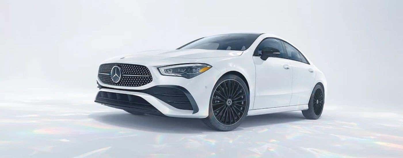 A white 2025 Mercedes-Benz CLA for sale from the front at an angle.
