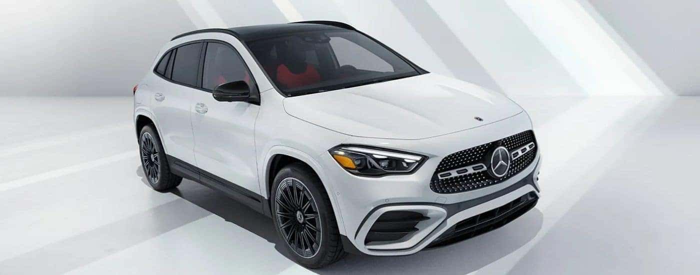 A white 2025 Mercedes-Benz GLA from the front at an angle.