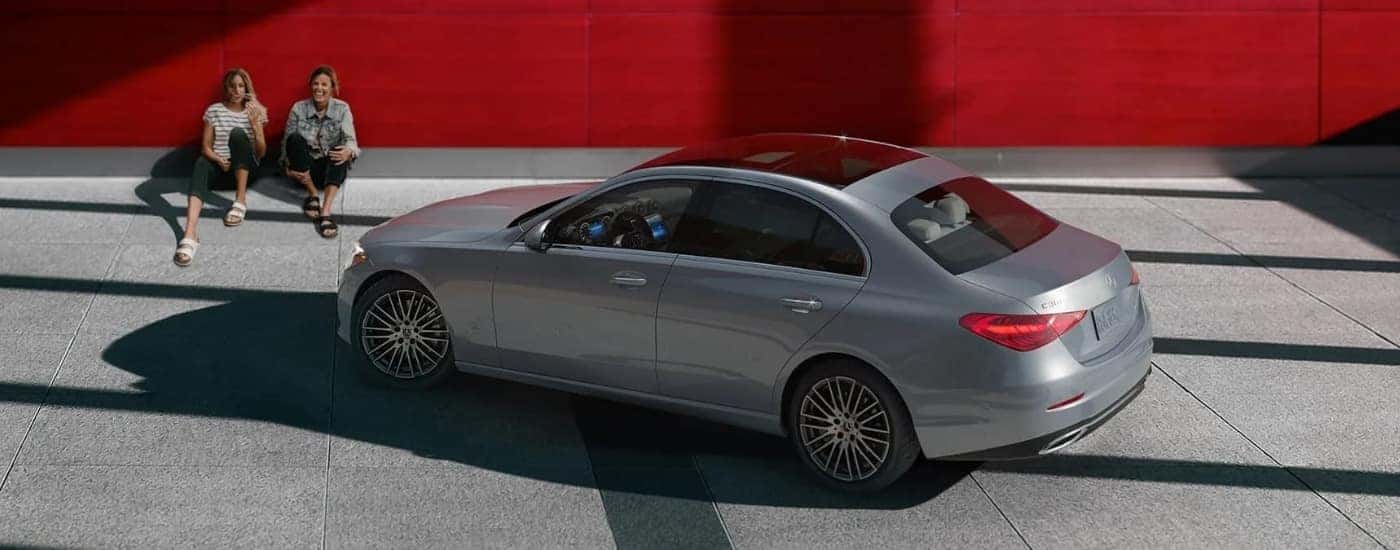 A silver 2025 Mercedes-Benz C-300 parked from a dealer near Alexandria