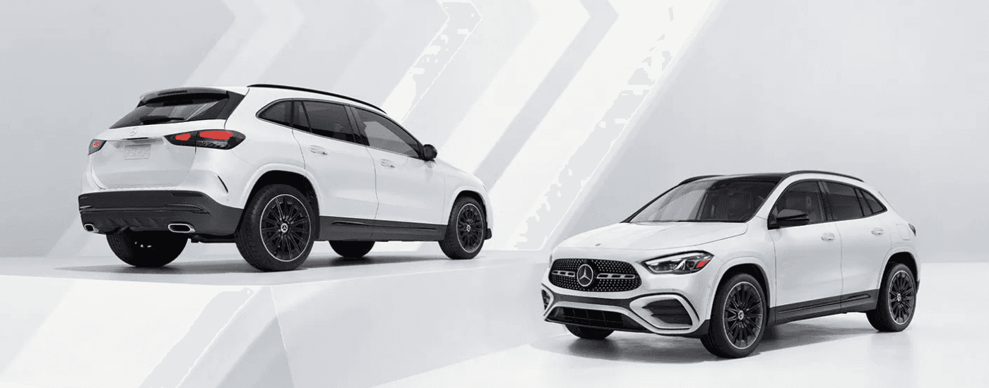 Two white 2026 Mercedes-Benz GLA's parked side by side