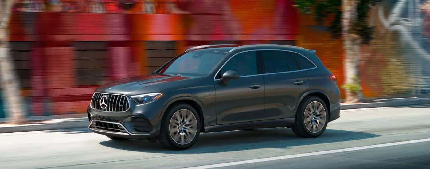 Grey 2026 Mercedes-Benz GLC driving through a city