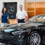 Salesperson and Client in the Mercedes-Benz of Sugar Land Showroom