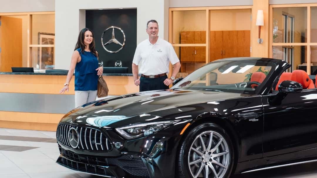 Salesperson and Client in the Mercedes-Benz of Sugar Land Showroom