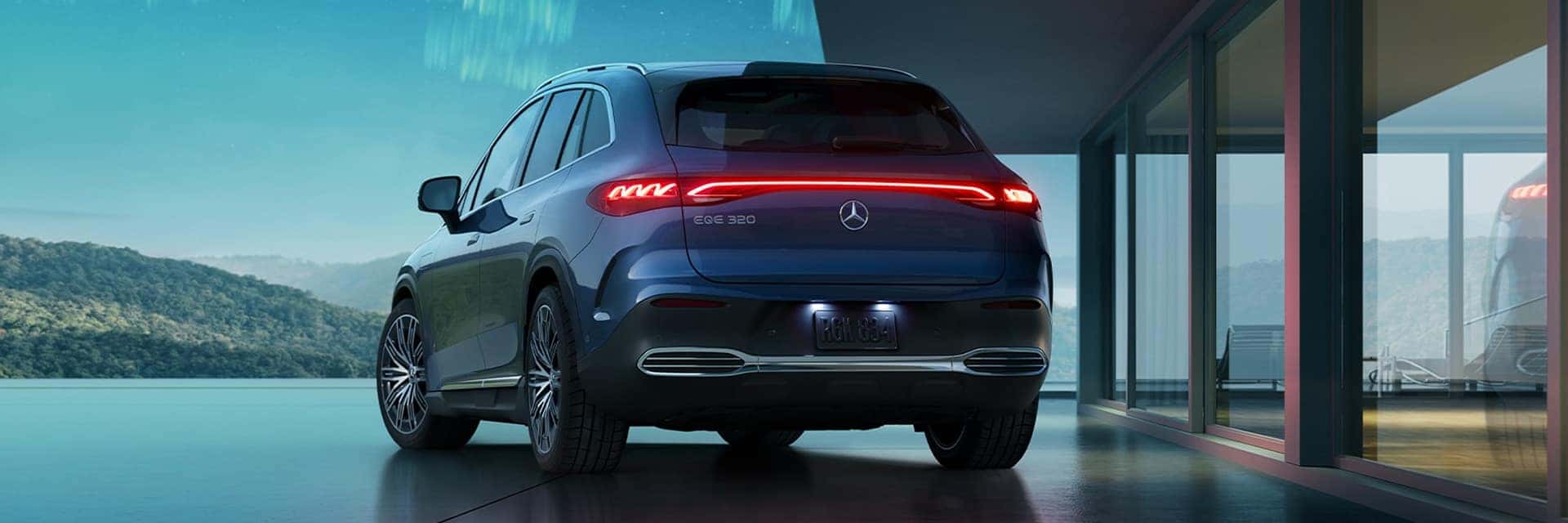 rear view of 2027 eqe suv parked in front of home