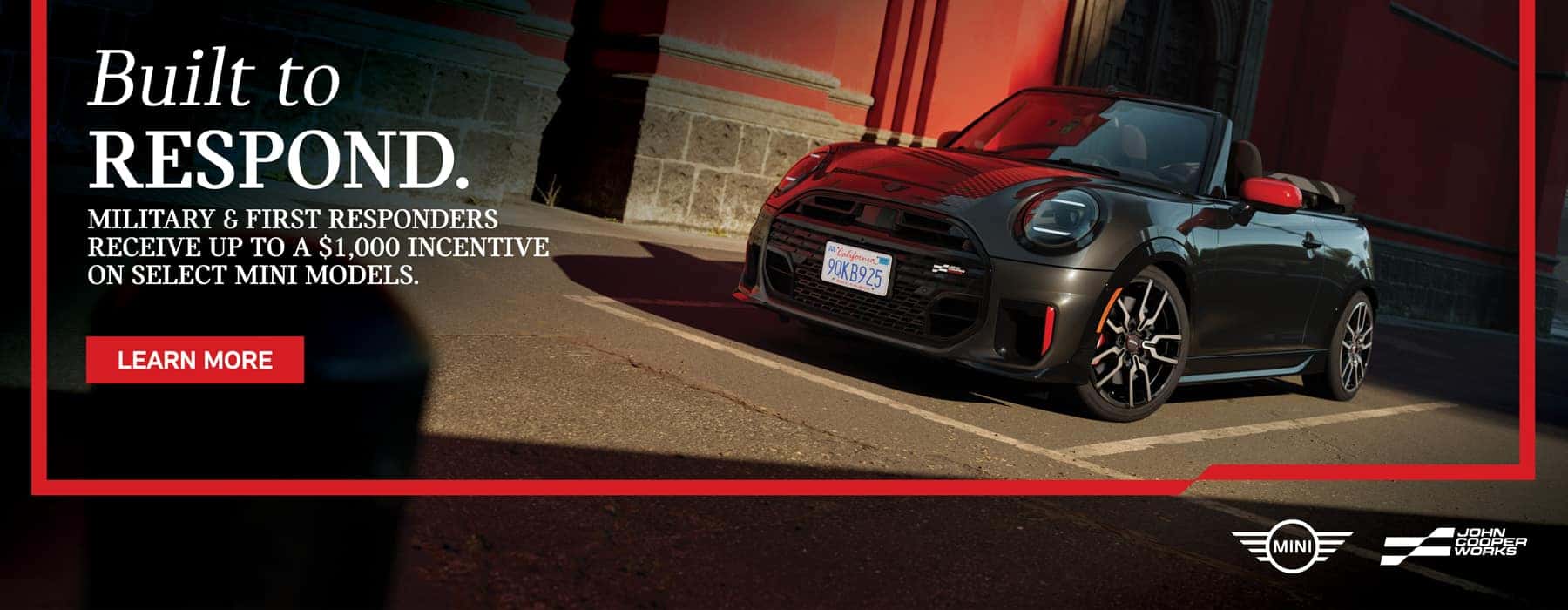 Black JCW convertible parked.