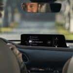 Couple in front seats of 2025 Mazda CX-30