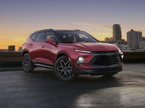 2024 Chevrolet Blazer parked outside a city at sunset