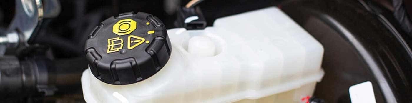 Close up view of a bottle of brake fluid