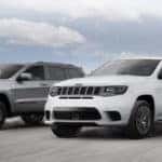 Three 2019 Jeep Grand Cherokee Driving